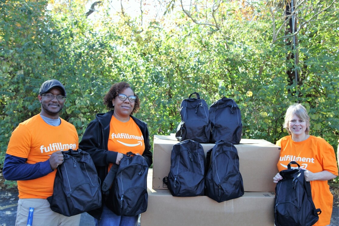 Amazon associates fill backpacks with essentials to support non-profits 