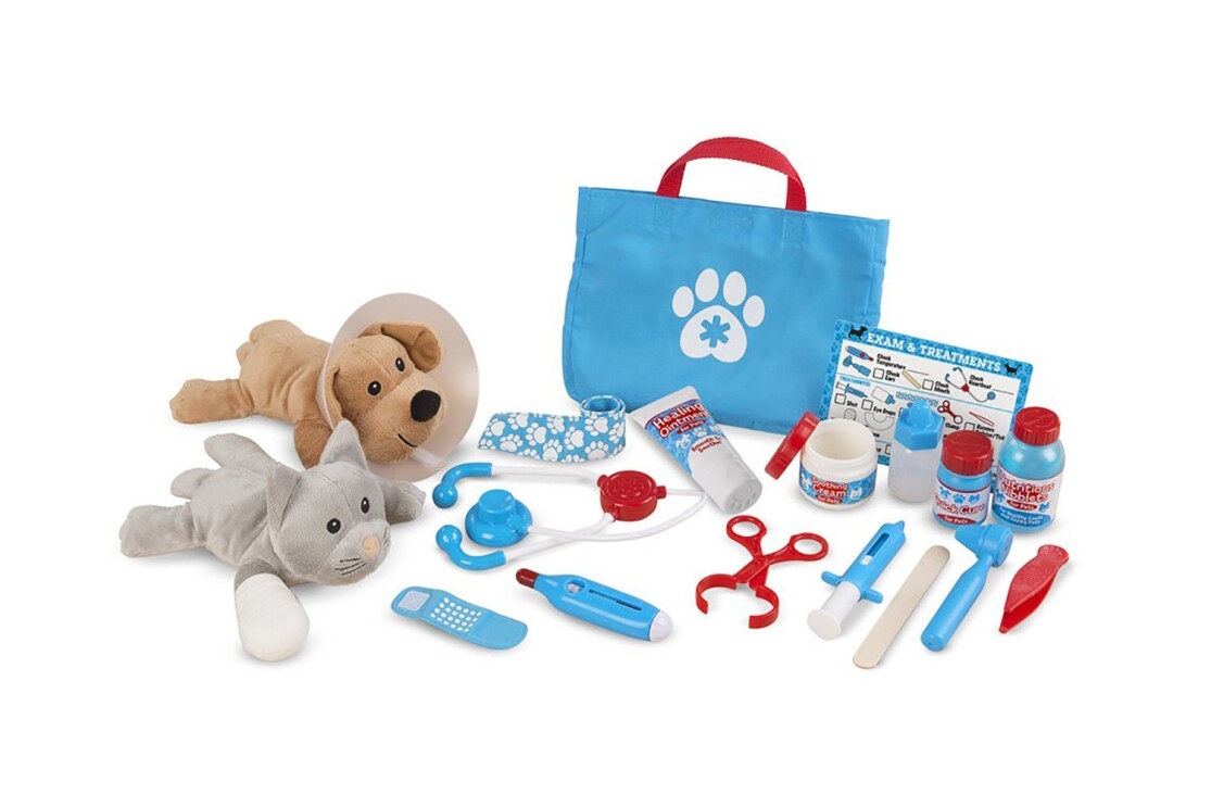 A 24-piece Melissa & Doug Examine and Treat pretend play pet vet set with plush dog and cat, play stethoscope, thermometer, syringe, ear scope, tweezers, clamp, cast, bandages, "treatments," and "ointments," with a reusable double-sided checklist