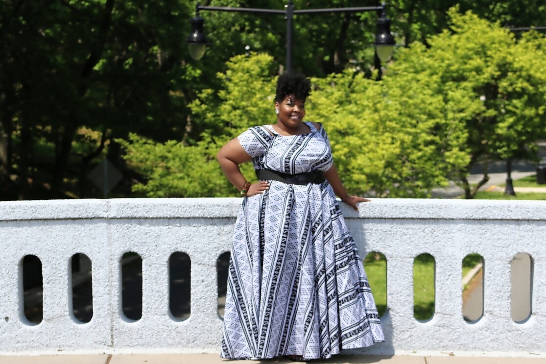 A supporter of the body positive movement smiles for a photo.