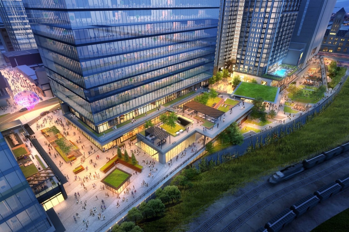 Preview of the new Amazon building coming to Nashville, Tennessee. Street view of the exterior of the building and surrounding sidewalks and green space.