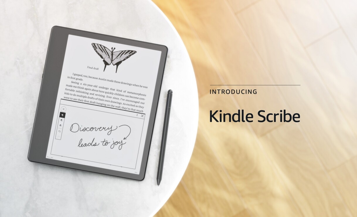 An image of a Kindle Scribe and pen sitting on a marble table and text on the left that reads "Introducing Kindle Scribe." 