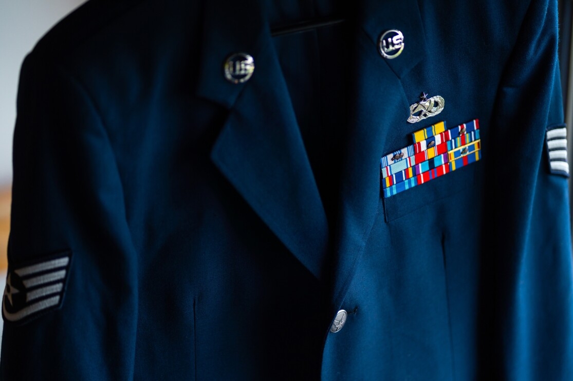 A blue blazer with military insignia.