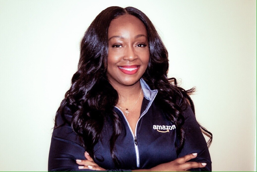 An image of an Amazon recruiter looking at the camera for a photo.