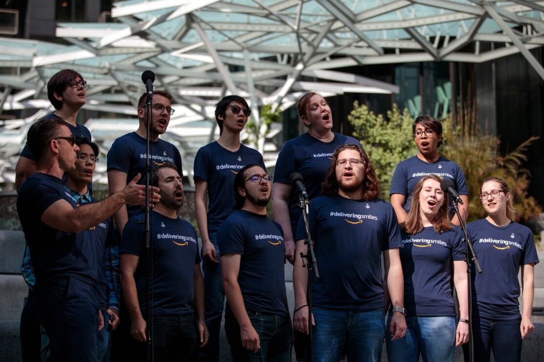 Members of Amazon's 'Vocally Self Critical' a cappella group perform a song that they will sing as part of the upcoming Opening Ceremony of the USA Games. 