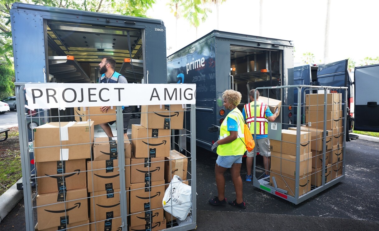 Amazon employees surprise nonprofits and schools with donations of various items.