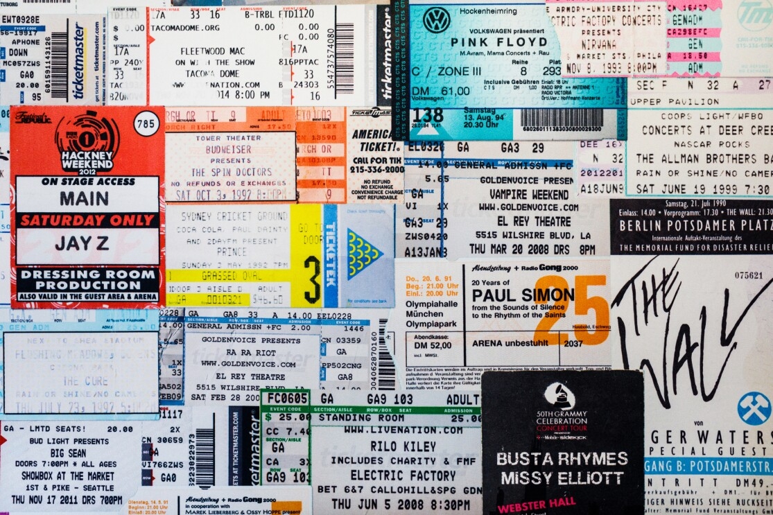 A collection of concert tickets on the wall of the Amazon Music office in Seattle, WA.