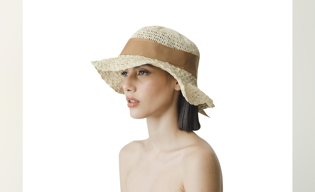 An image of a model wearing a hat by Sensi Studio.