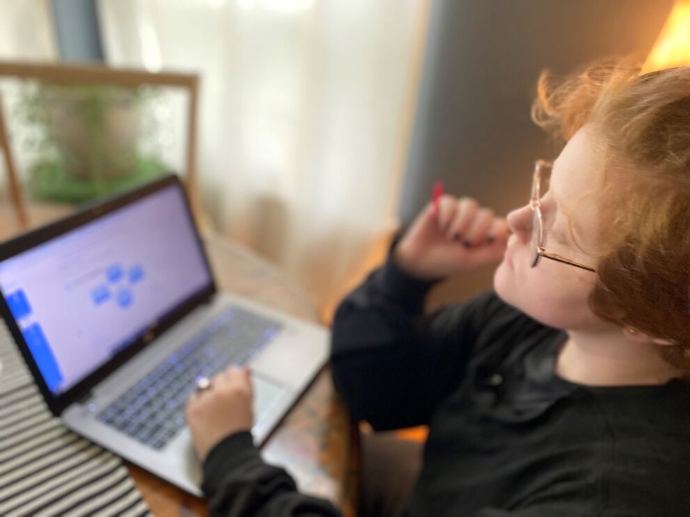 Amazon Future Engineer student learning computer science skills from home.