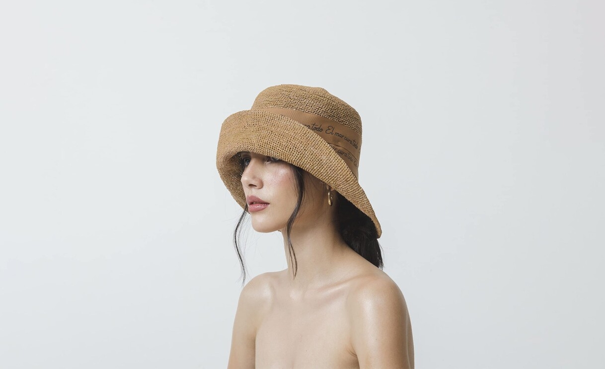 An image of a model wearing a hat by Sensi Studio.