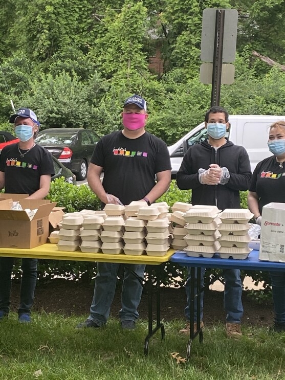 Amazon donates meals to local rescue workers and employs local restaurant Freddie's Bar and Grill in their HQ2 location to prepare the meals