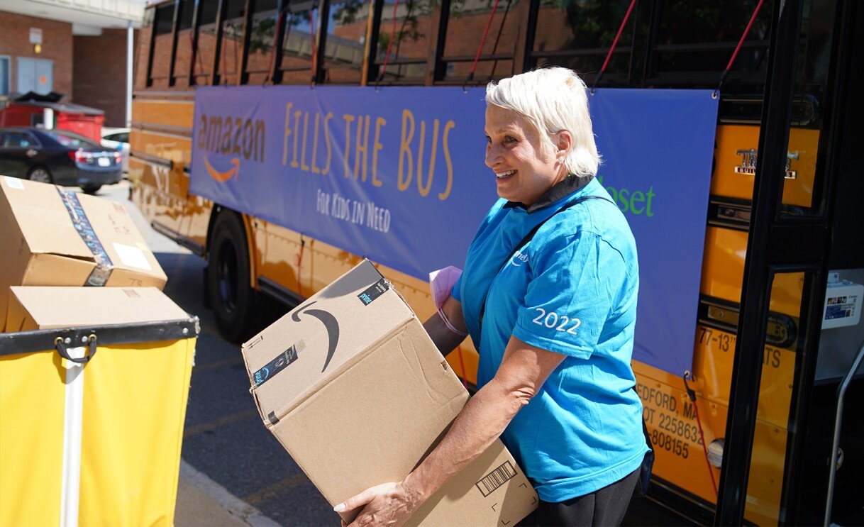 Amazon employees surprise nonprofits and schools with donations of various items.