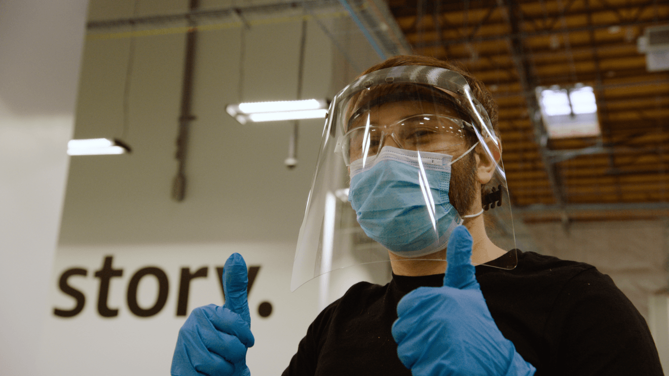 Volunteers work together to use technology to make PPE for medical professionals during the COVID-19 pandemic