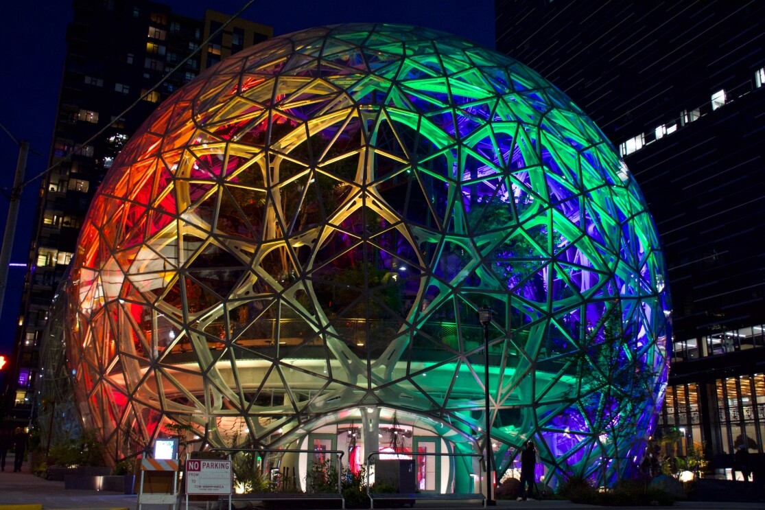 The Seattle Spheres at Amazon HQ in Seattle, WA lit up in rainbow colors to mark LGBTQ Pride month in June.