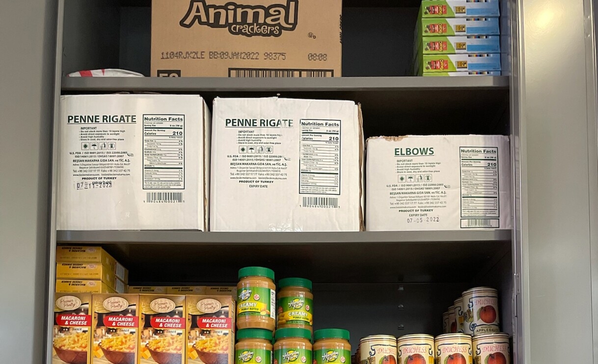 An image of a food pantry full off assorted food items. 