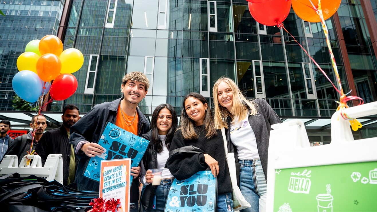 An image of a group joining together at the Amazon Web Services event at Amazon's headquarters in Seattle