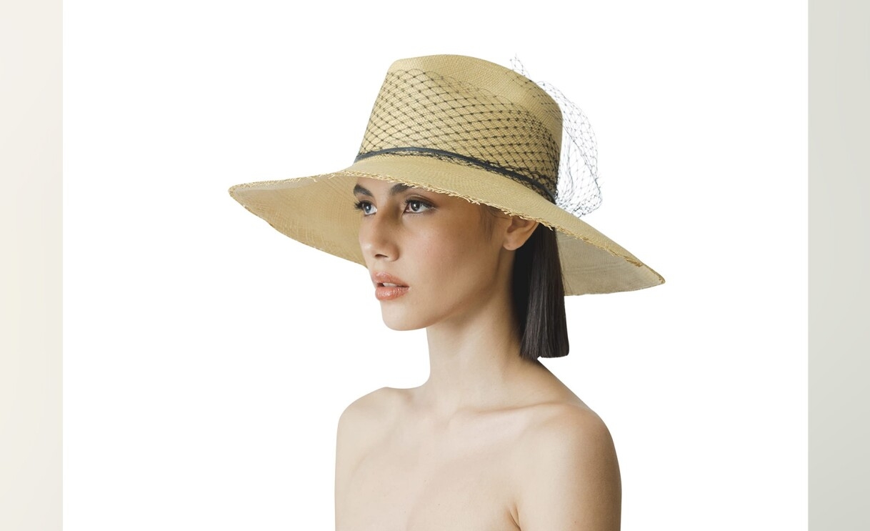 An image of a model wearing a hat by Sensi Studio.