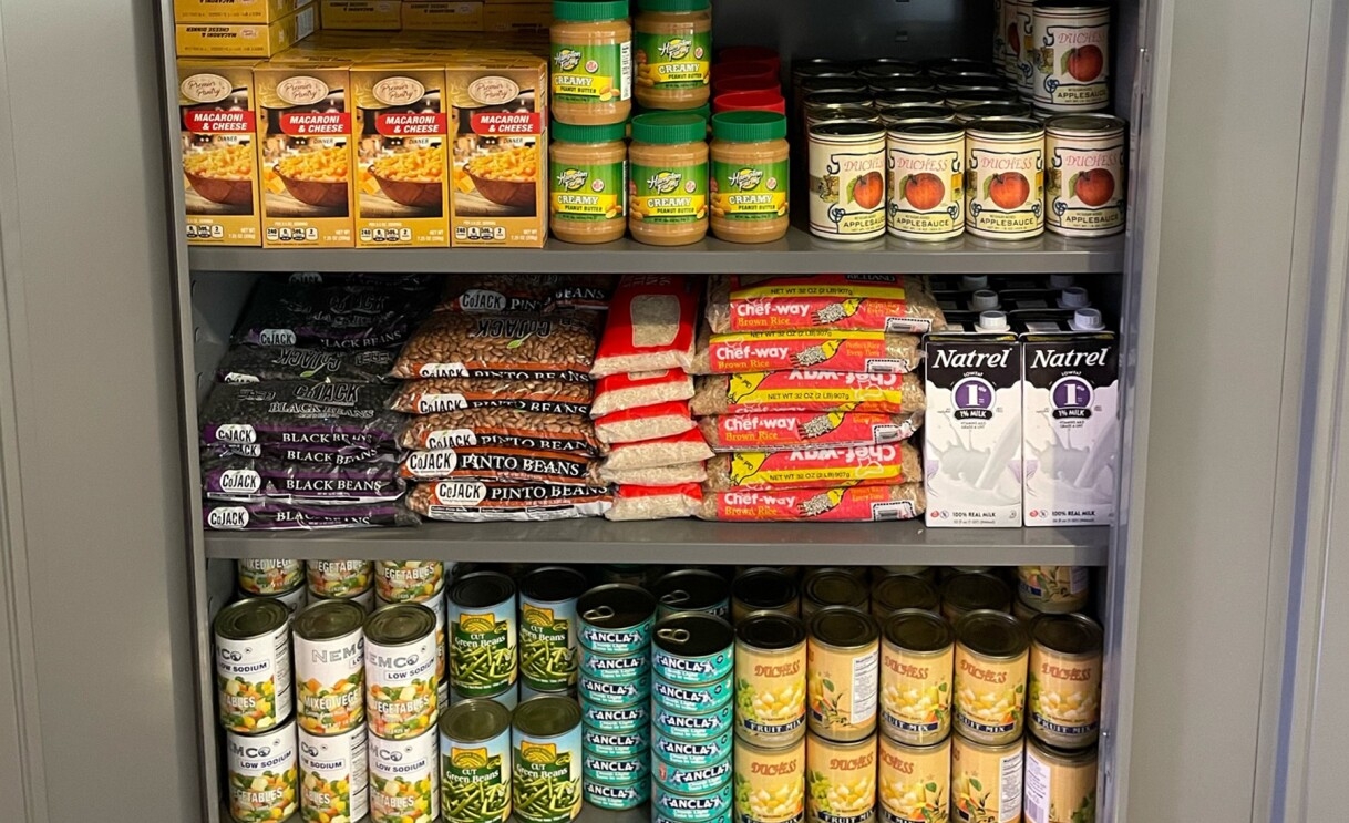 An image of a food pantry full off assorted food items. 