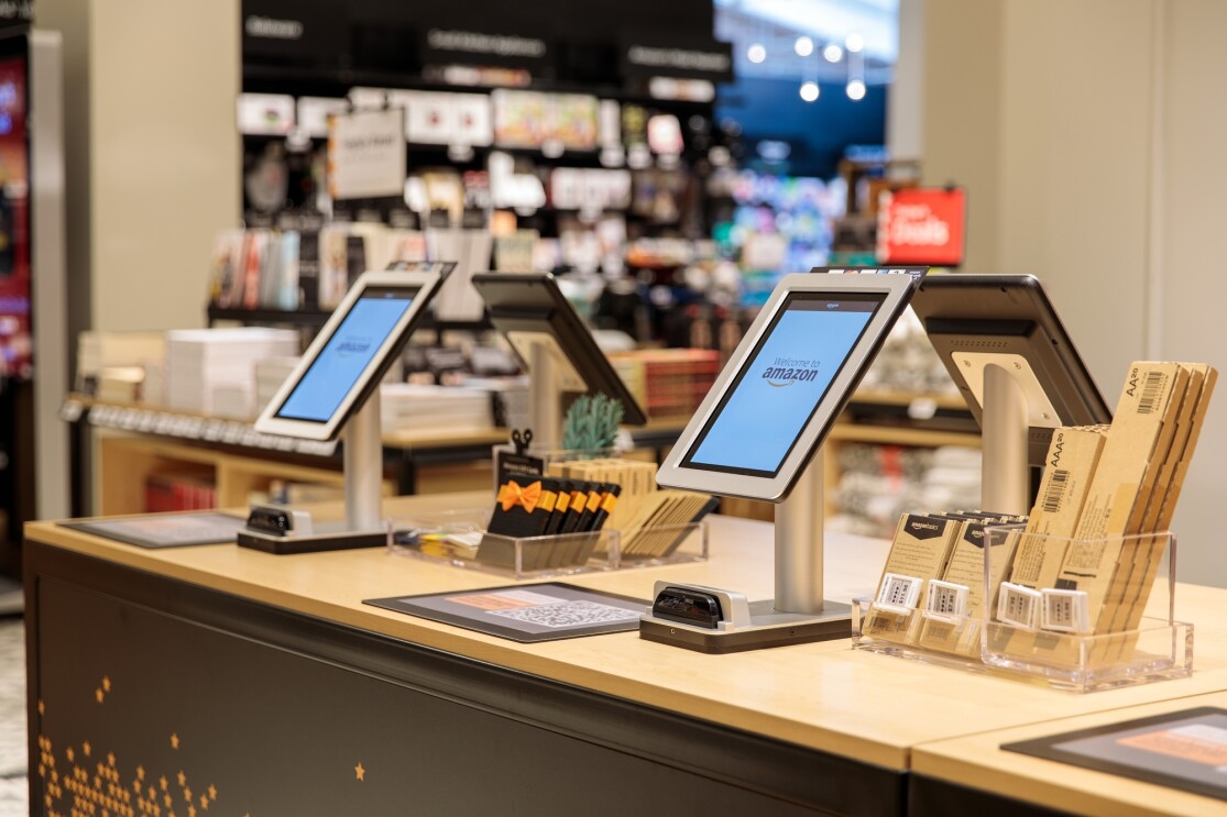 Checkout kiosks at the Amazon 4-star store. The four checkouts include a tablet, card reader, barcode to scan from the Amazon app, along with batteries and Amazon gift cards. 